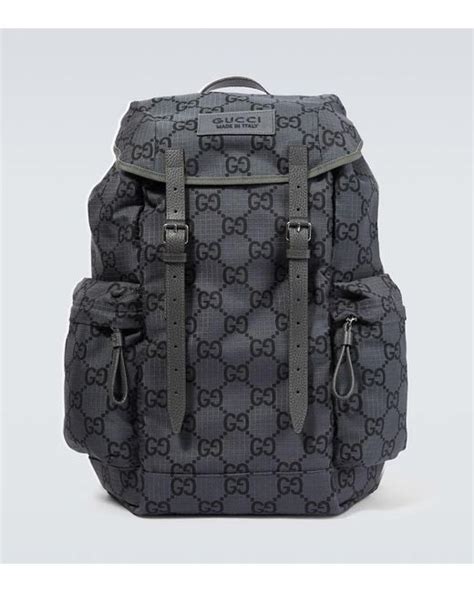 flawless gucci large backpack|Large GG backpack in grey and black GG leather .